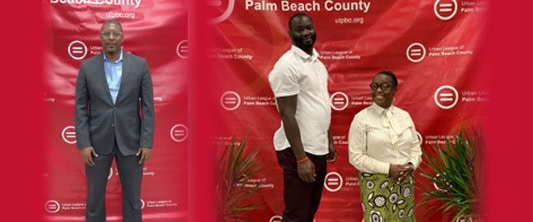 people in front of Urban League backdrop