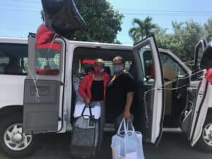 people in front of a van