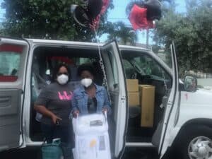 people in front of a van