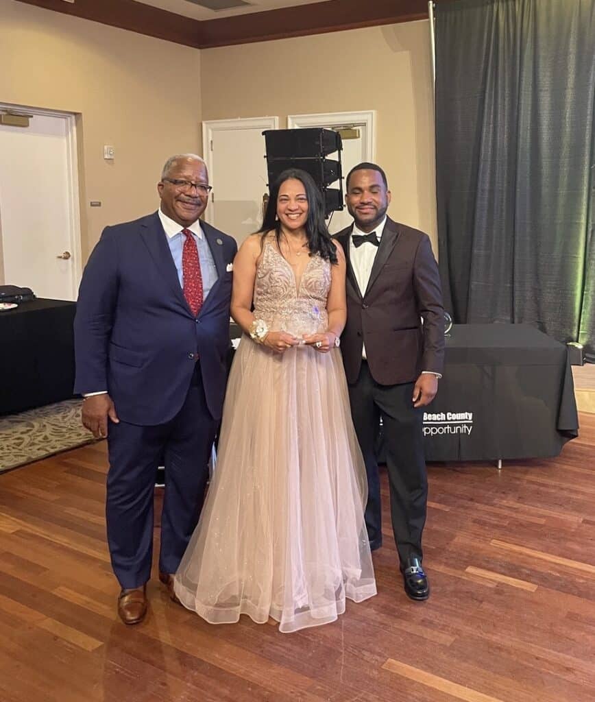 Soulan Johnson with two other men