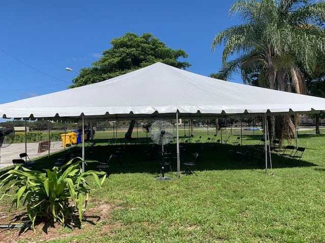 white tent set up on a lawn