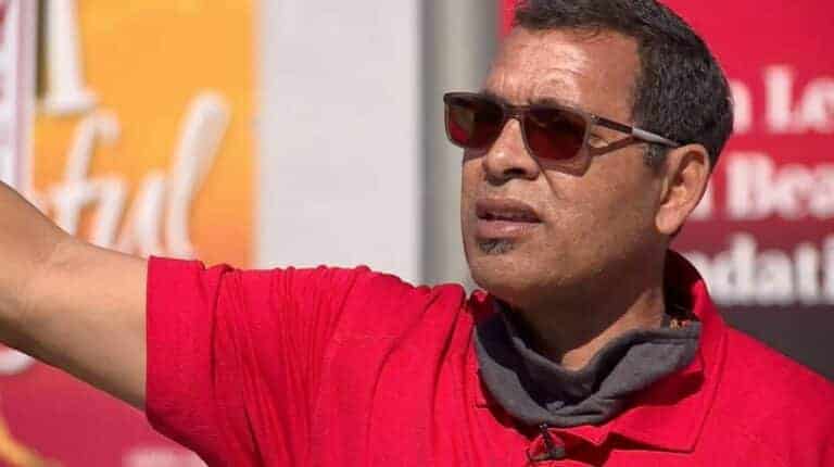 man wearing sunglasses and a red shirt
