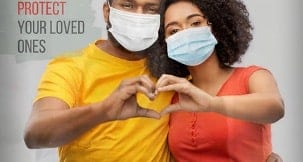 two people in a masks wearing a yellow shirt and a red shirt